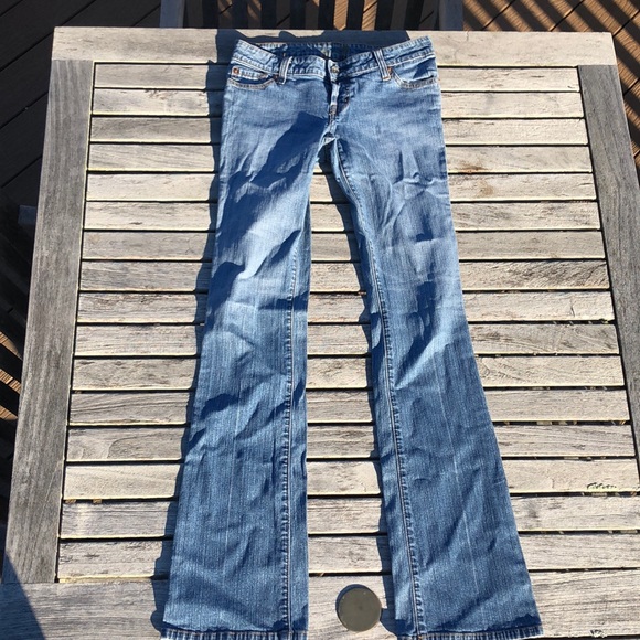 Seven brand medium denim. Slightly worn. - Picture 1 of 4